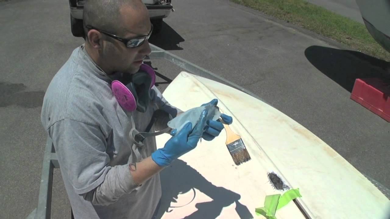 Fiberglass repair work on boat hull